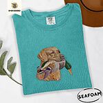 Seafoam Comfort Colors T-shirt embroidered with a yellow Labrador head carrying a mallard drake in its mouth