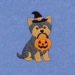 Close-up of the embroidered Yorkshire Terrier in a witch hat with a jack-o'-lantern candy bucket